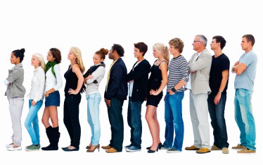 Happy group of people standing in a line.With copyspace